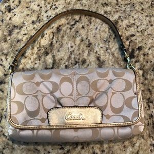 Used coach gold/tan clutch/ wristlet